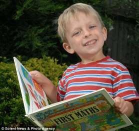 Boy holding a book Boy holding a book